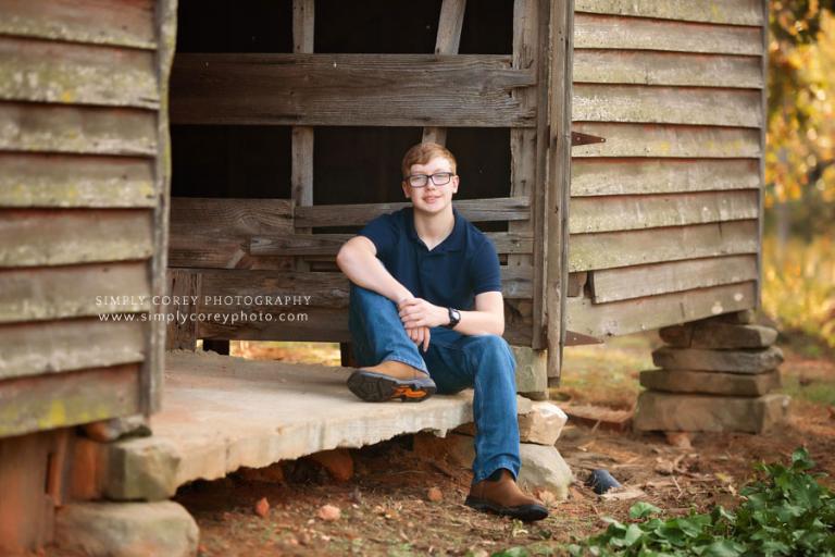 Newnan photographer, teen portrait outside in an old barn