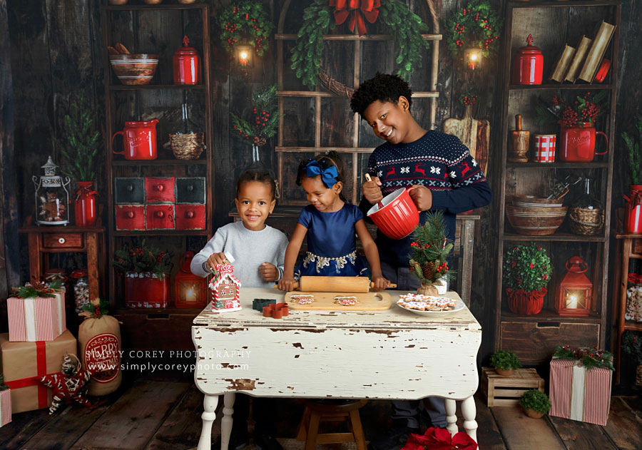 mini session photographer near Dallas, GA; kids baking Christmas cookies in studio