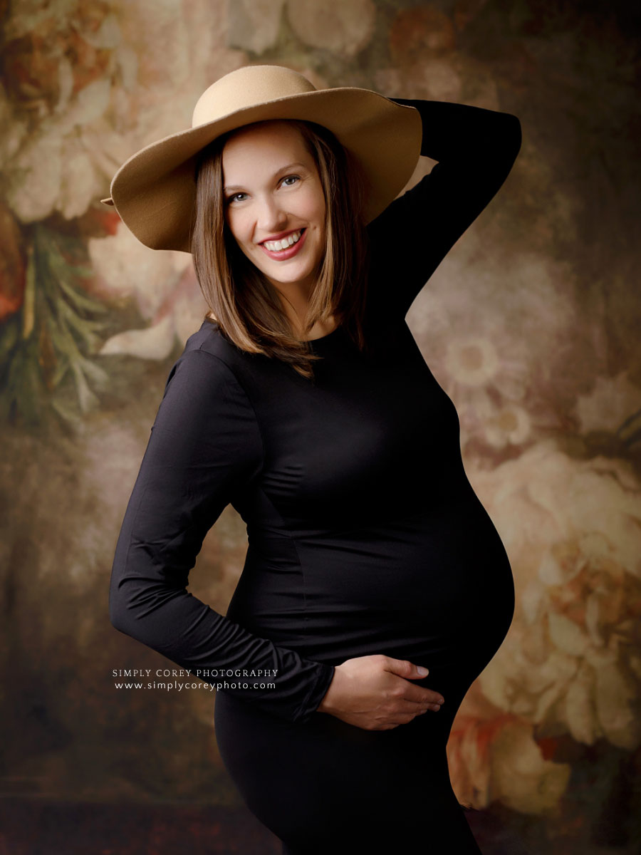 Atlanta maternity photographer, pregnant mom in black dress and boho hat