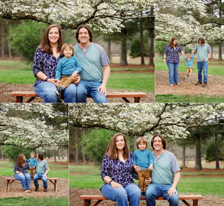 Villa Rica family photographer, parents and toddler by dogwood tree in spring