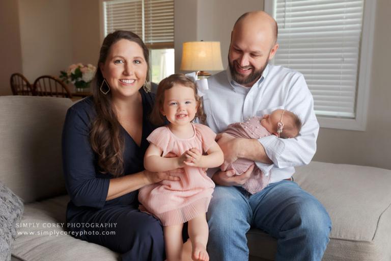 family photographer near Carrollton, GA; in-home newborn session in living room