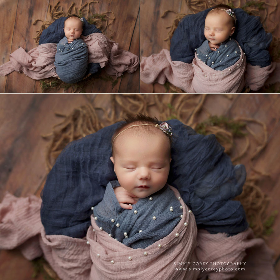 newborn photographer near Peachtree City, baby with navy and mauve wraps in basket