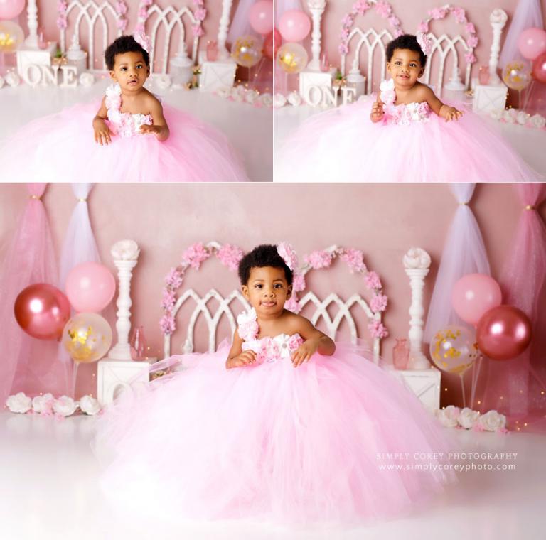 baby-photographer-near Dallas, GA; girl in tutu dress before cake smash