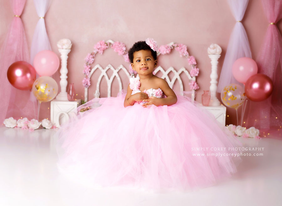 Lithia Springs baby photographer, studio cake smash set with pink balloons and tulle
