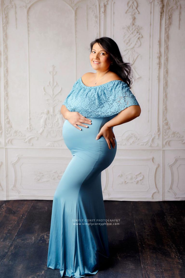 maternity photographer near Atlanta, studio portrait of mom in blue dress with lace