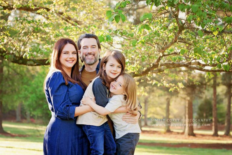 Atlanta family photographer, spring morning session outside by dogwood tree