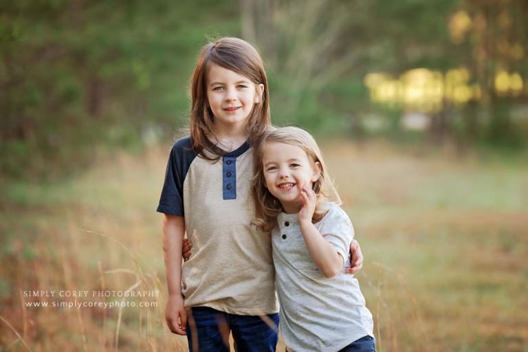 Atlanta kids photographer, brothers outside during family portrait session