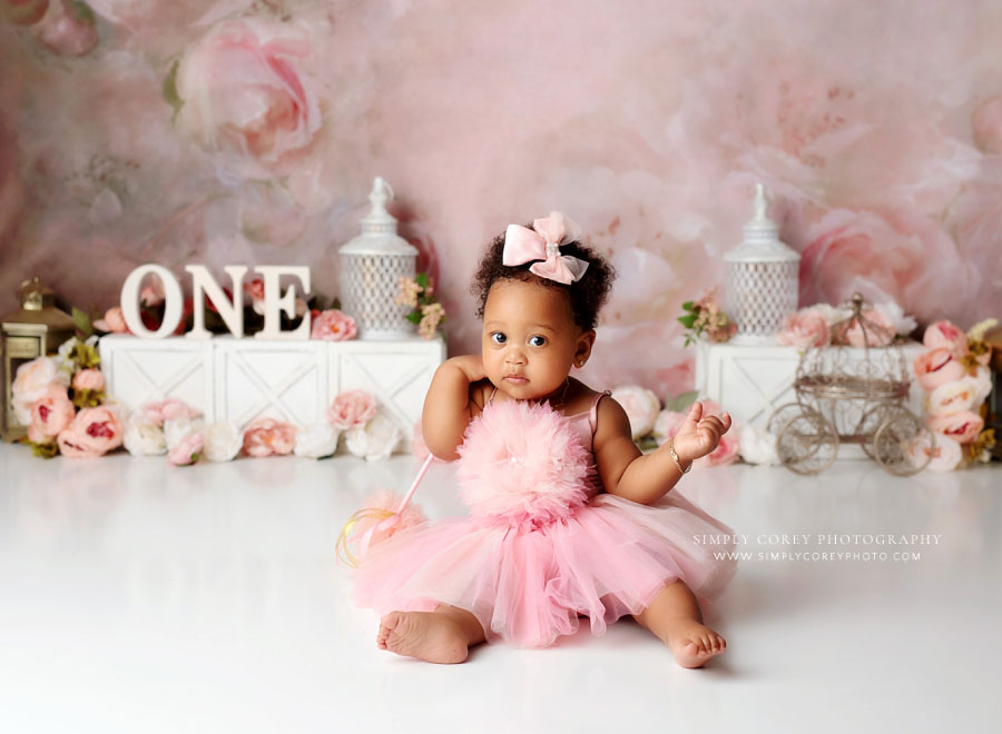 Atlanta baby photographer, one year old with pink princess wand before cake smash