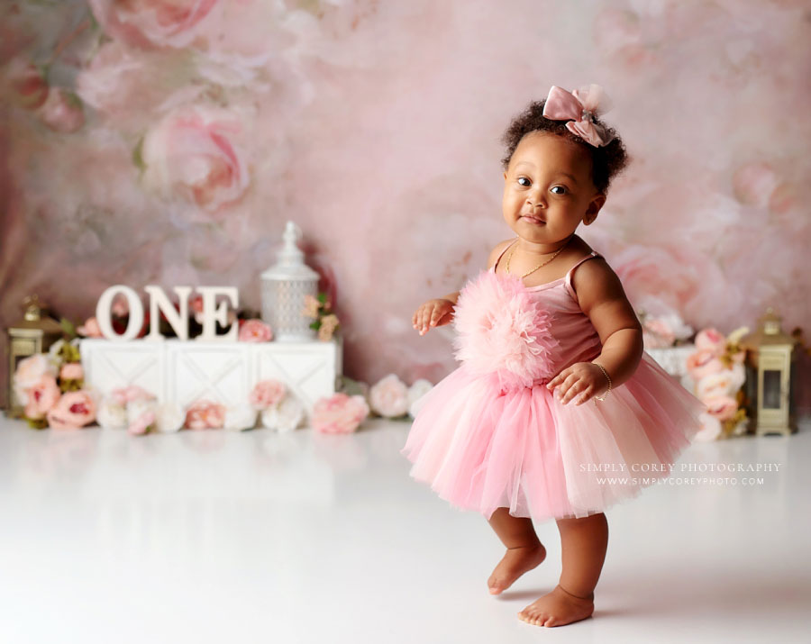 Carrollton baby photographer in GA, one year old in pink tulle dress before cake smash