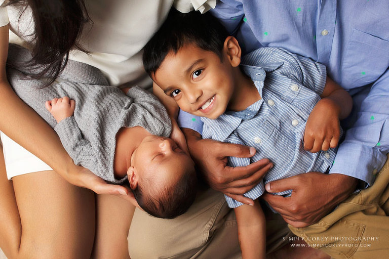 Douglasville newborn photographer, family portrait with new baby and big brother