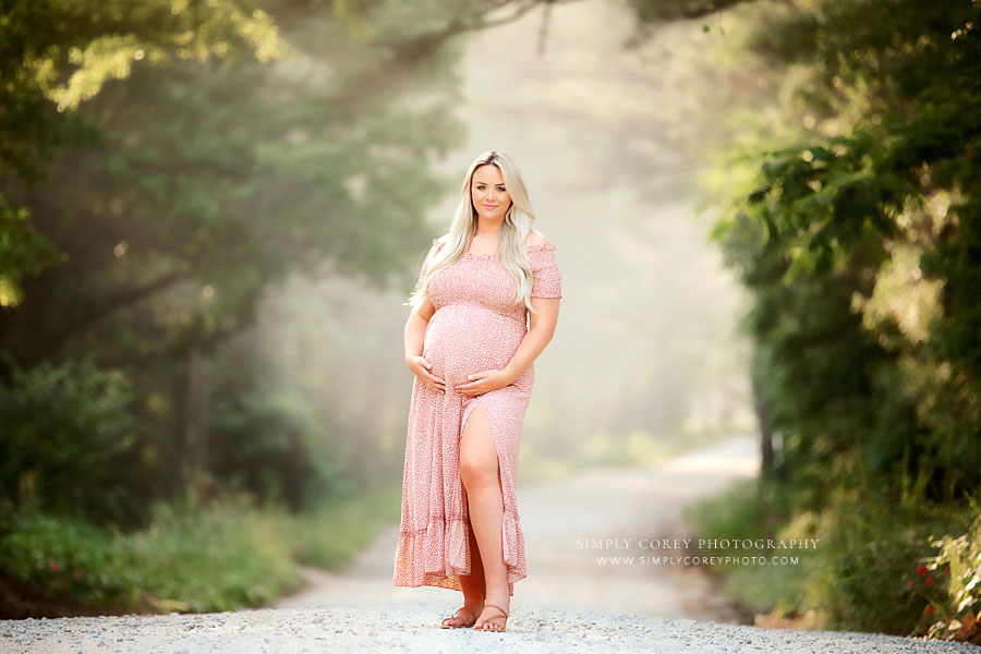 Atlanta maternity photographer-expecting mom outside on country road