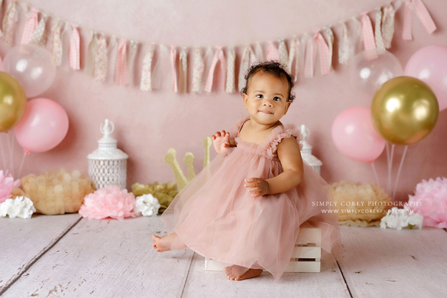 baby photographer near Carrollton, GA; one year old girl pink and gold milestone session