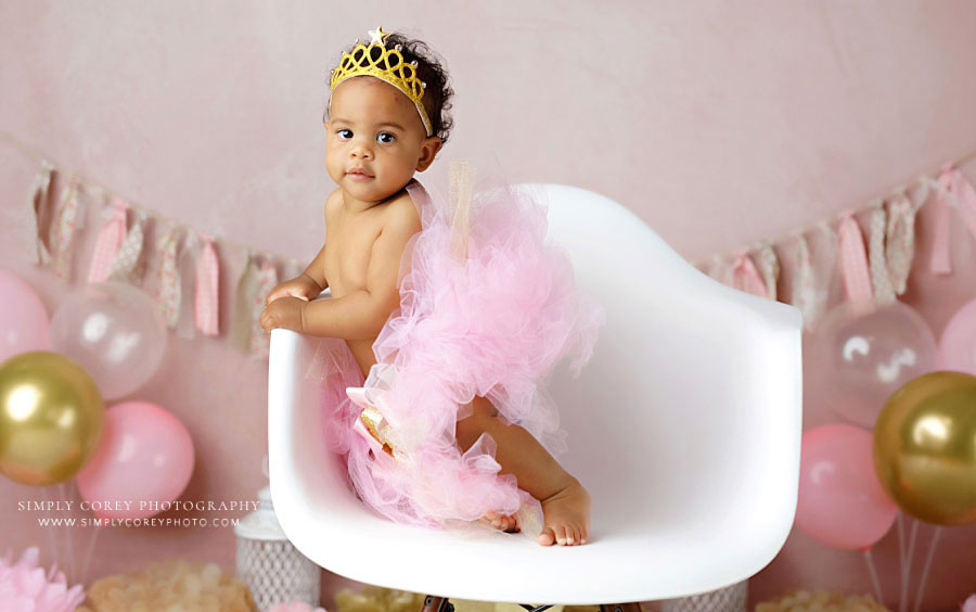 Mableton baby photographer, girl with pink tutu in chair for one year milestone session