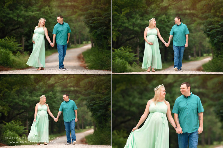 Bremen maternity photographer, expecting couple walking outside on country road