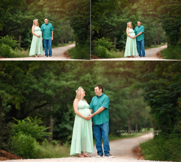 Douglasville maternity photographer, couple in green outside on dirt country road