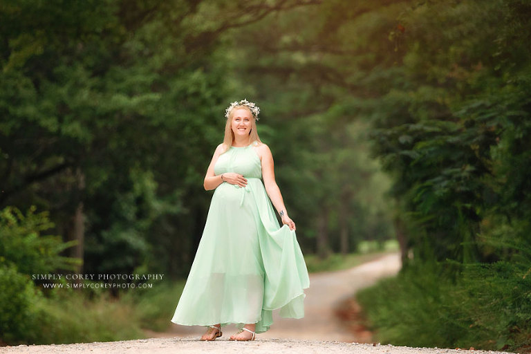 maternity photographer near Peachtree City, pregnant mom outside in green dress in summer