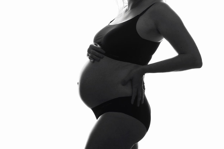 maternity photography session near Atlanta, black and white studio pregnancy portrait