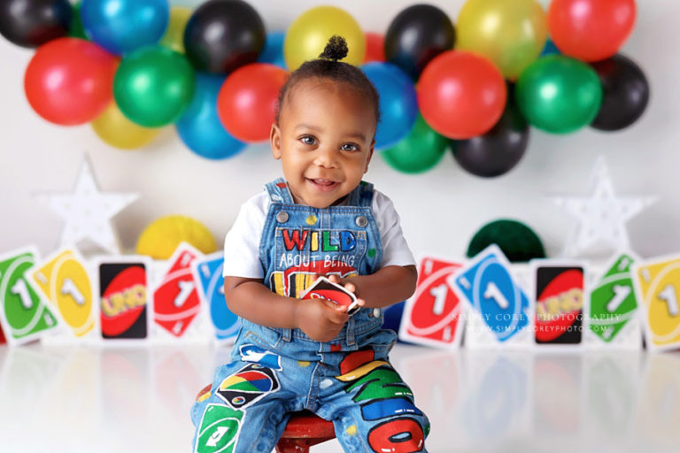 baby photographer near Newnan, studio milestone session with uno theme