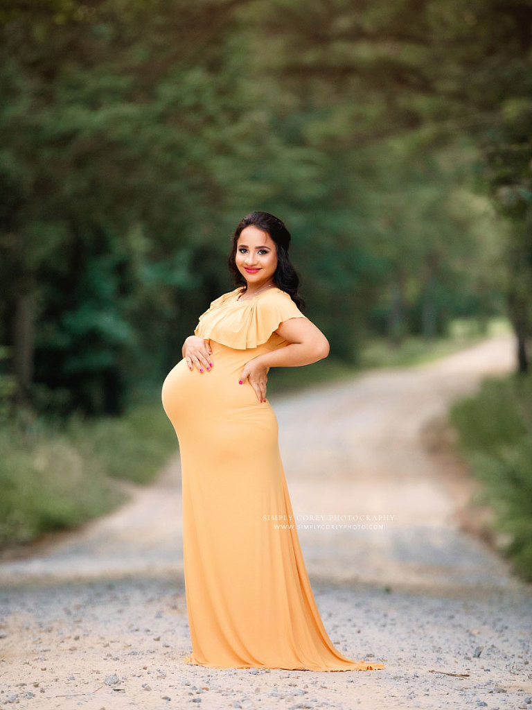 Atlanta maternity photographer, pregnancy portrait outside in yellow dress