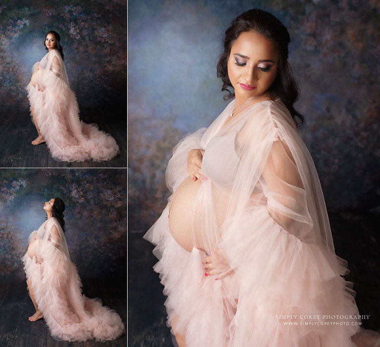 maternity photographer near Atlanta, studio portrait session with pink tulle robe and floral backdrop
