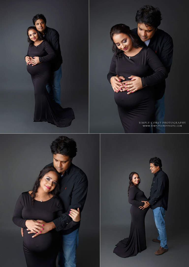 Villa Rica maternity photographer, couple wearing black with gray studio backdrop