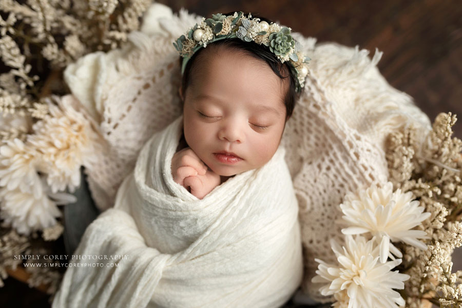 newborn photographer near Atlanta, baby girl in off white set with flowers
