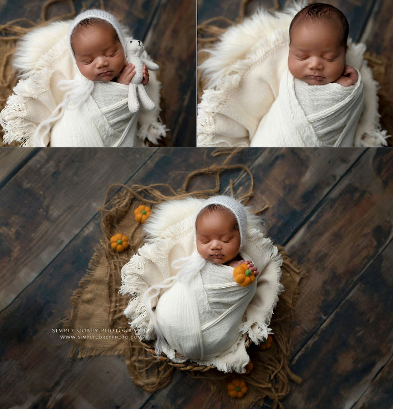 Newnan newborn photographer, baby boy in basket with white studio set