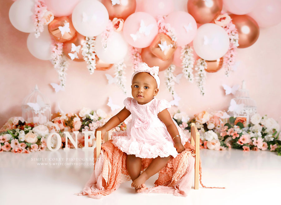 Douglasville baby photographer, pink floral studio set for one year milestone session