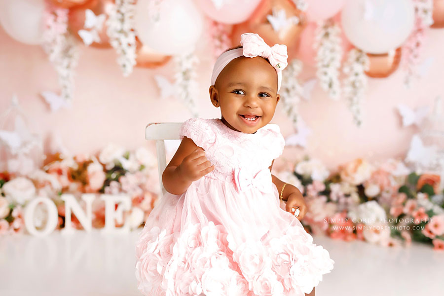 Newnan baby photographer, one year milestone session with pink florals and balloons