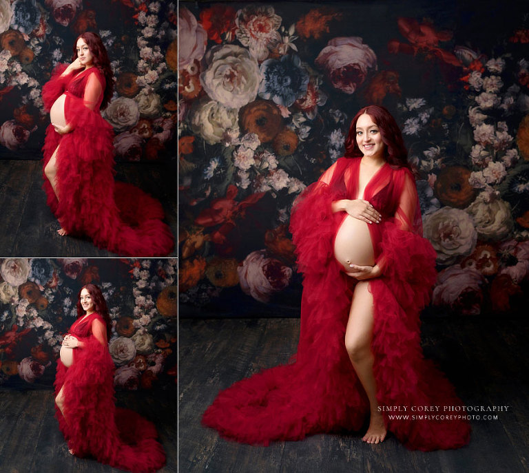 maternity photographer near Carrollton, GA; studio portraits with red tulle and floral backdrop