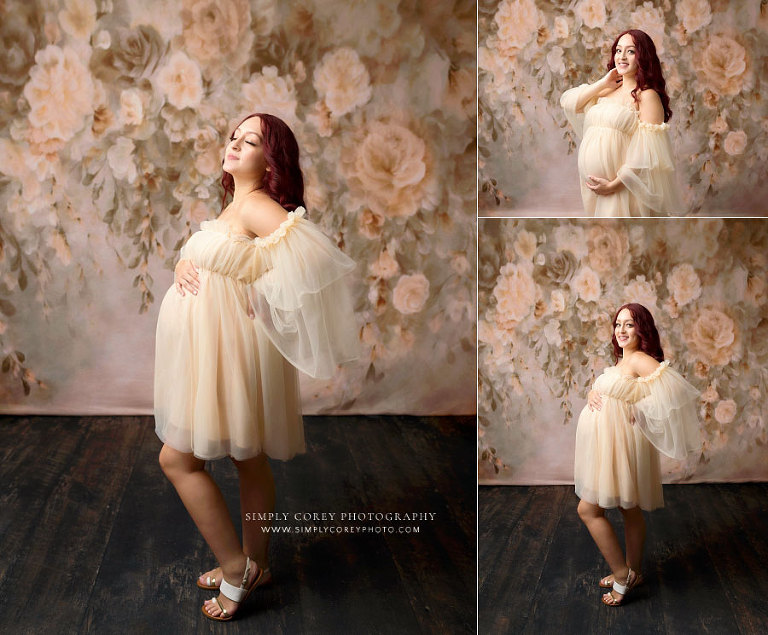 maternity photographer near Villa Rica, studio portraits with floral backdrop and short tulle dress