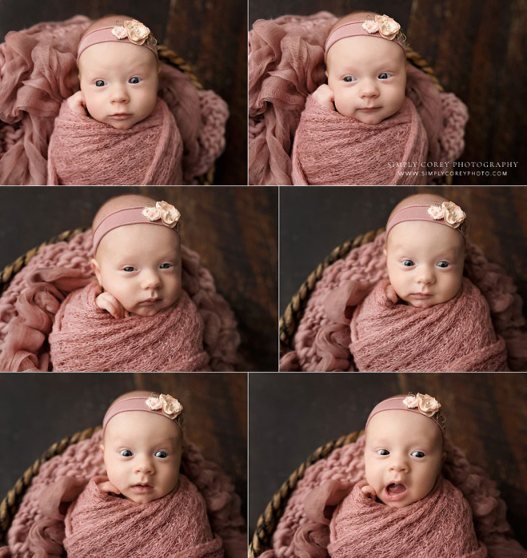 Carrollton newborn photographer in Georgia, awake baby girl in pink making funny expressions