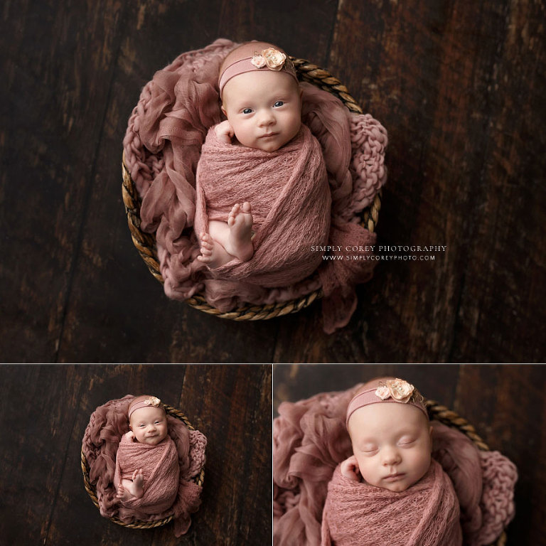 newborn photographer near Atlanta, baby girl in basket with rose pink wrap