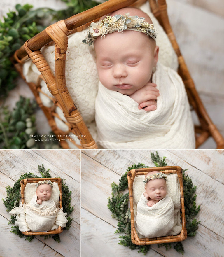 newborn photographer near Peachtree City, baby girl in rattan bed with ivory studio set