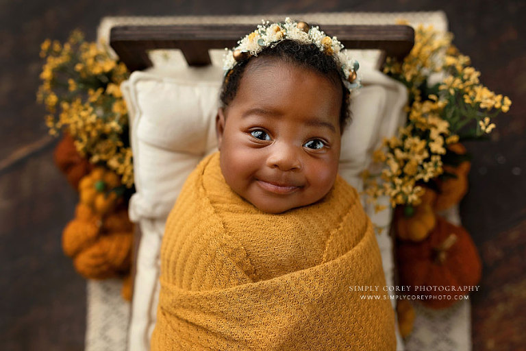 Atlanta newborn photographer, studio session with fall flowers and pumpkins