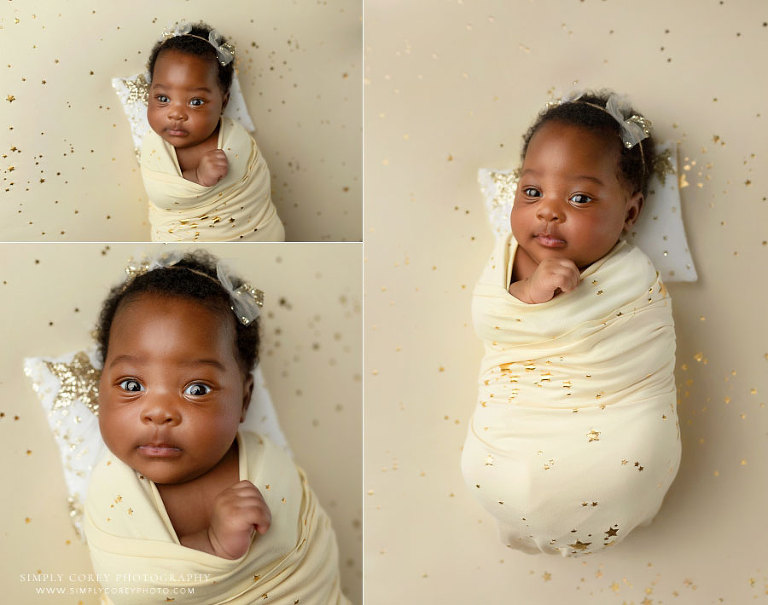 West Georgia newborn photographer, baby girl with star swaddle and pillow