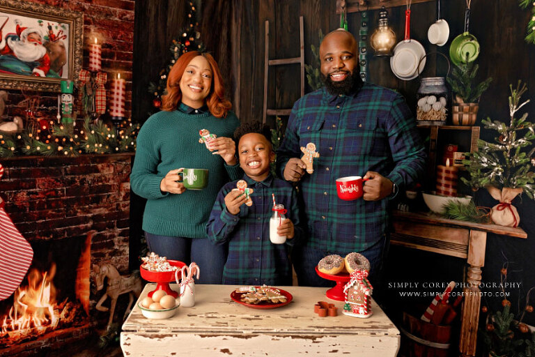 Carrollton mini session photographer in GA, family in Christmas kitchen with cookies