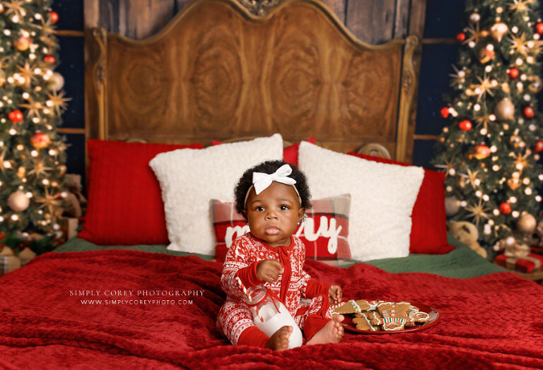 mini session photographer near Mableton, baby with milk and cookies in Christmas pajamas