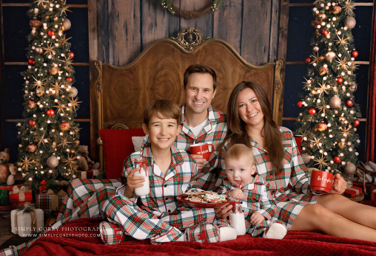 Dallas Georgia mini session photographer, family with baby in Christmas pajamas with cookies