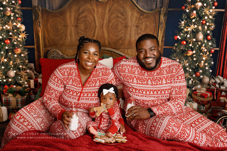 mini session photographer near Douglasville, family with baby in Christmas pajamas with cookies