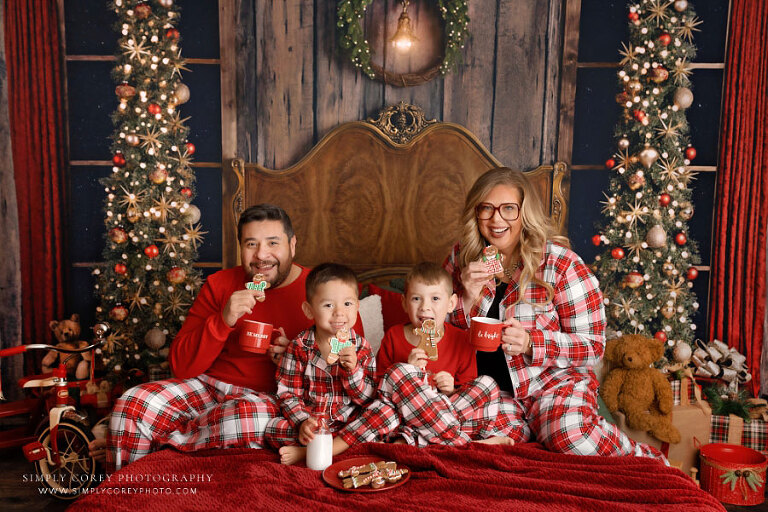 Villa Rica family photographer, Christmas pajama mini session on bed with cookies