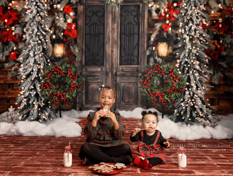 mini session photographer near Newnan, children with milk and cookies on Christmas studio set