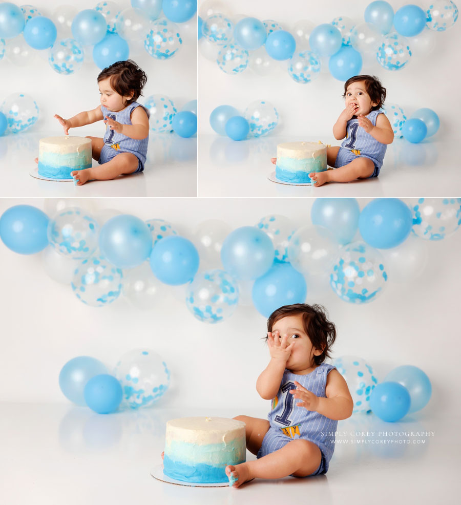 cake smash photographer near Newnan, baby eating cake on simple studio set