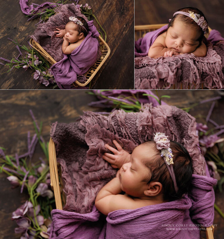 newborn photographer near Carrollton, GA; baby girl in basket with purple wrap and flowers