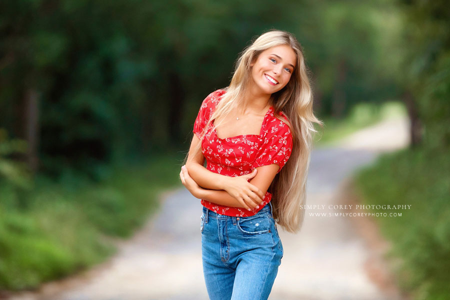 Carrollton senior portrait photographer in Georgia, teen outside on dirt road