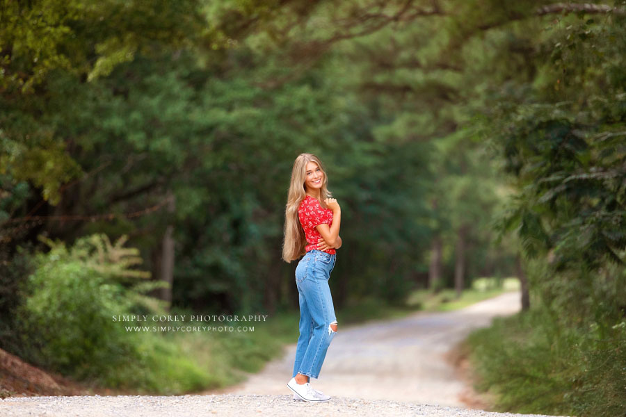 Villa Rica senior portrait photographer, teen girl in jeans on dirt road