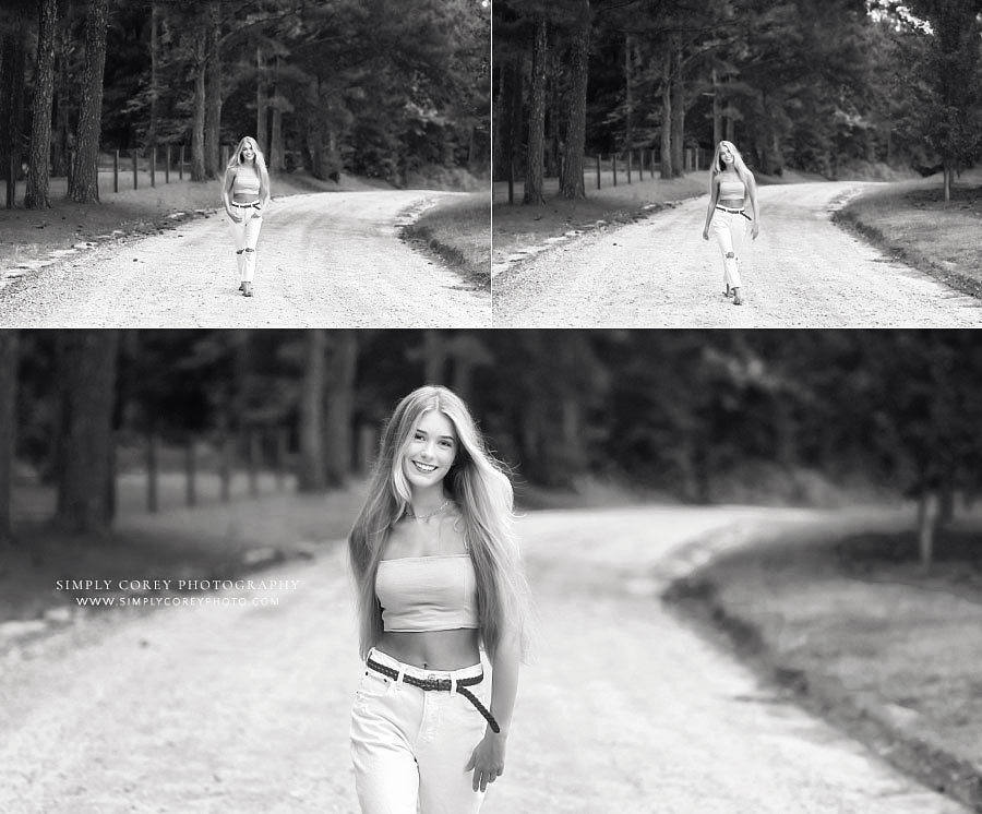 Villa Rica senior portraits in black and white of teen outside on dirt road