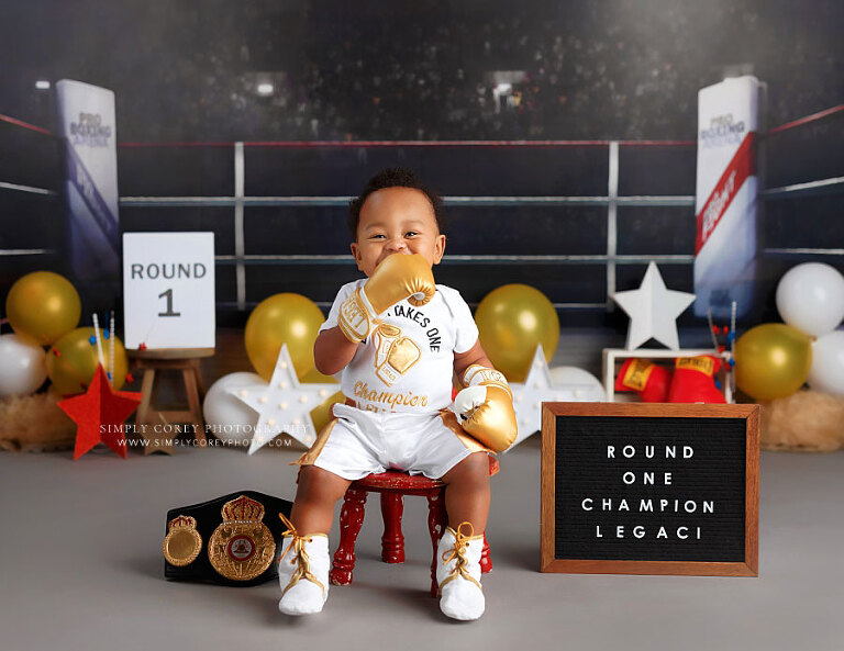 Atlanta baby photographer, boy in boxing gloves for milestone session