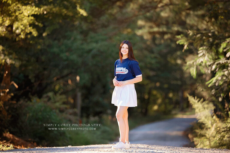 West Georgia senior portrait photographer, teen girl outside in senior jersey