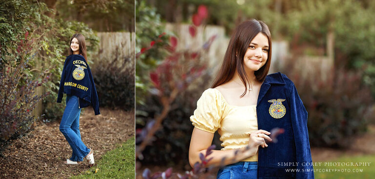 senior portrait photographer near Tallapoosa, teen girl outside in club jacket